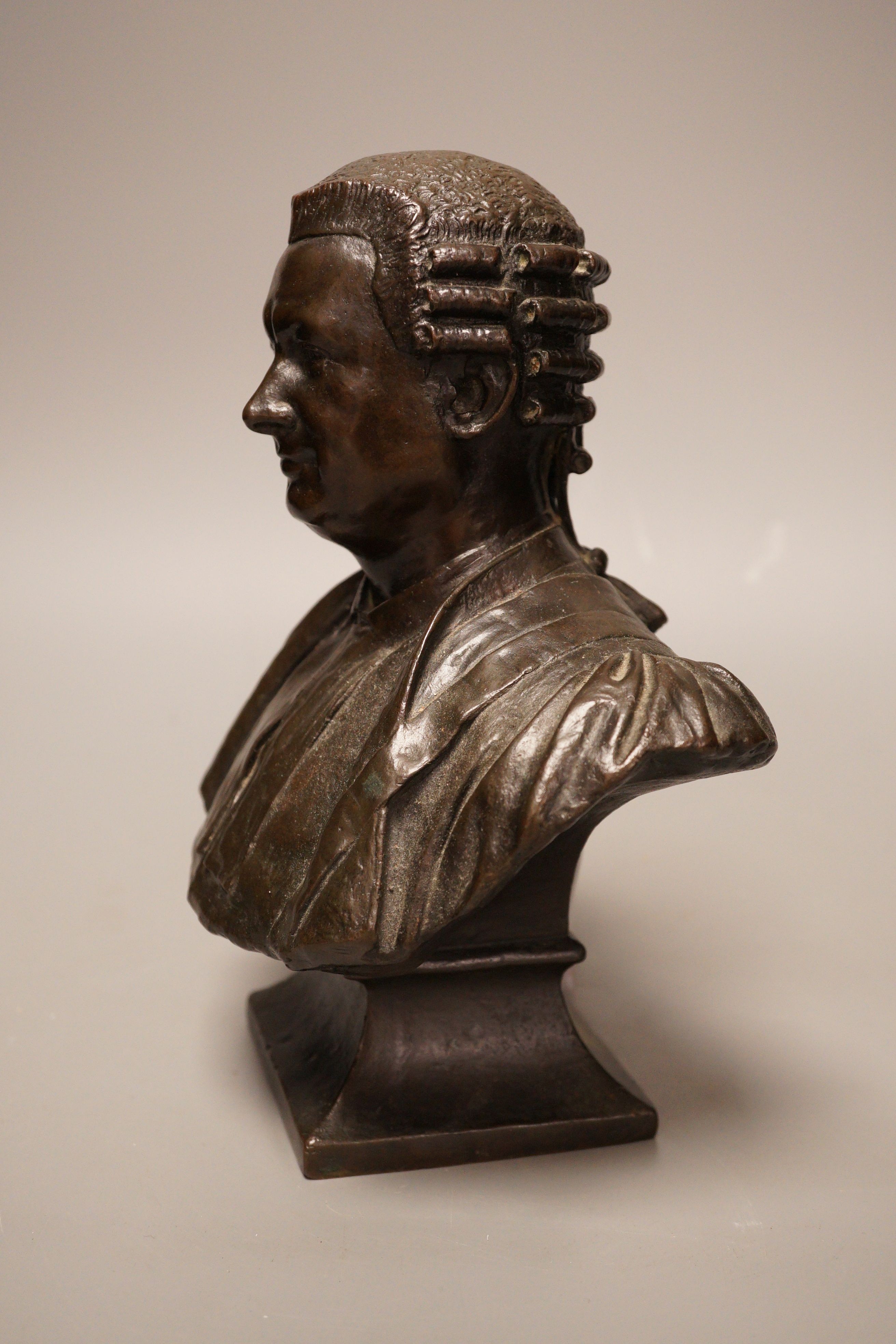 Andrea Carlo Lucchesi (1860-1924) a patinated bronze bust of a lawyer, signed verso, 26cm tall